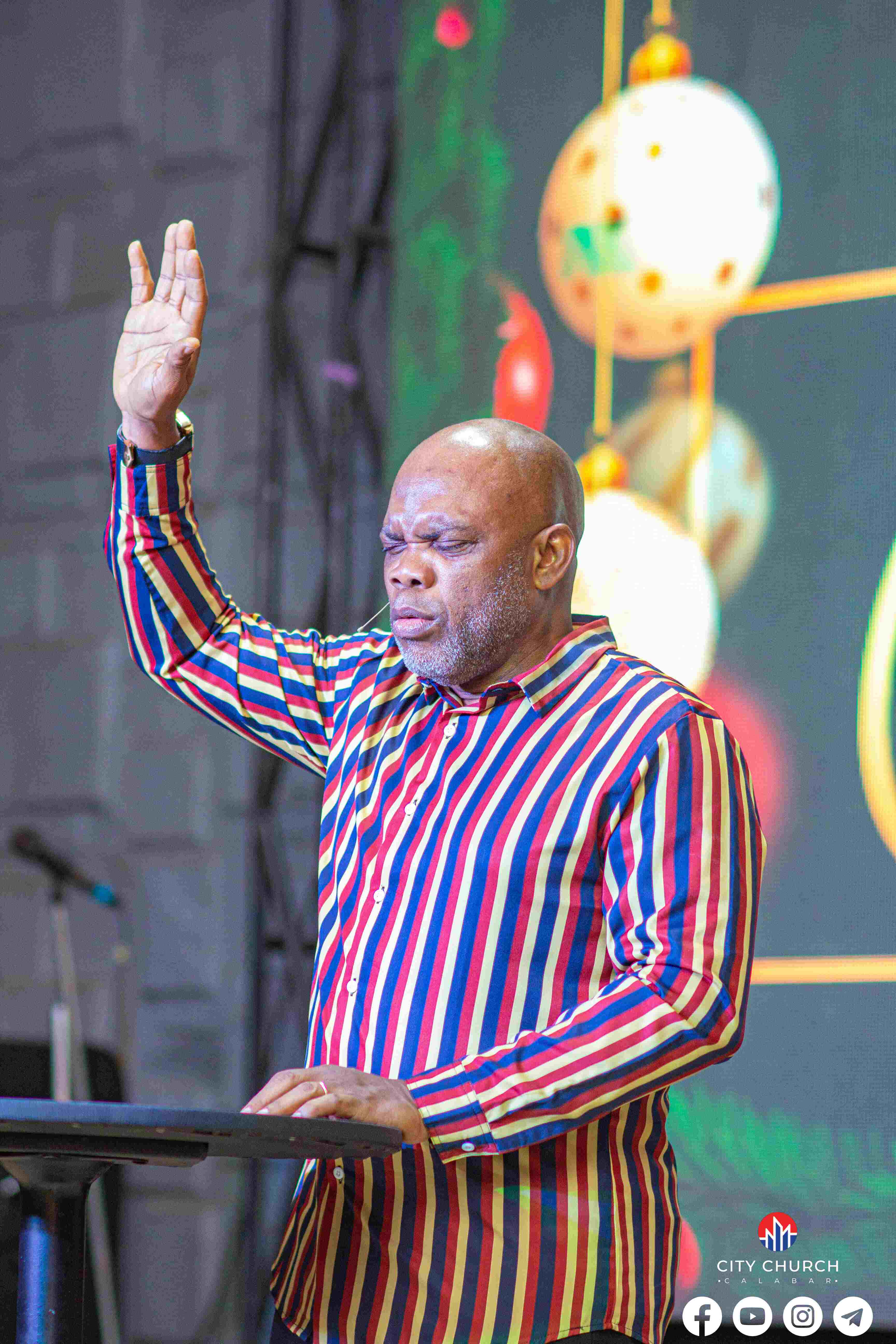 Pastor Tony ministering in action at City Church